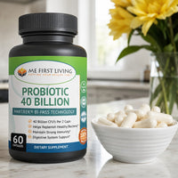 Probiotic supplement bottle with capsules on a marble surface, flowers in the background